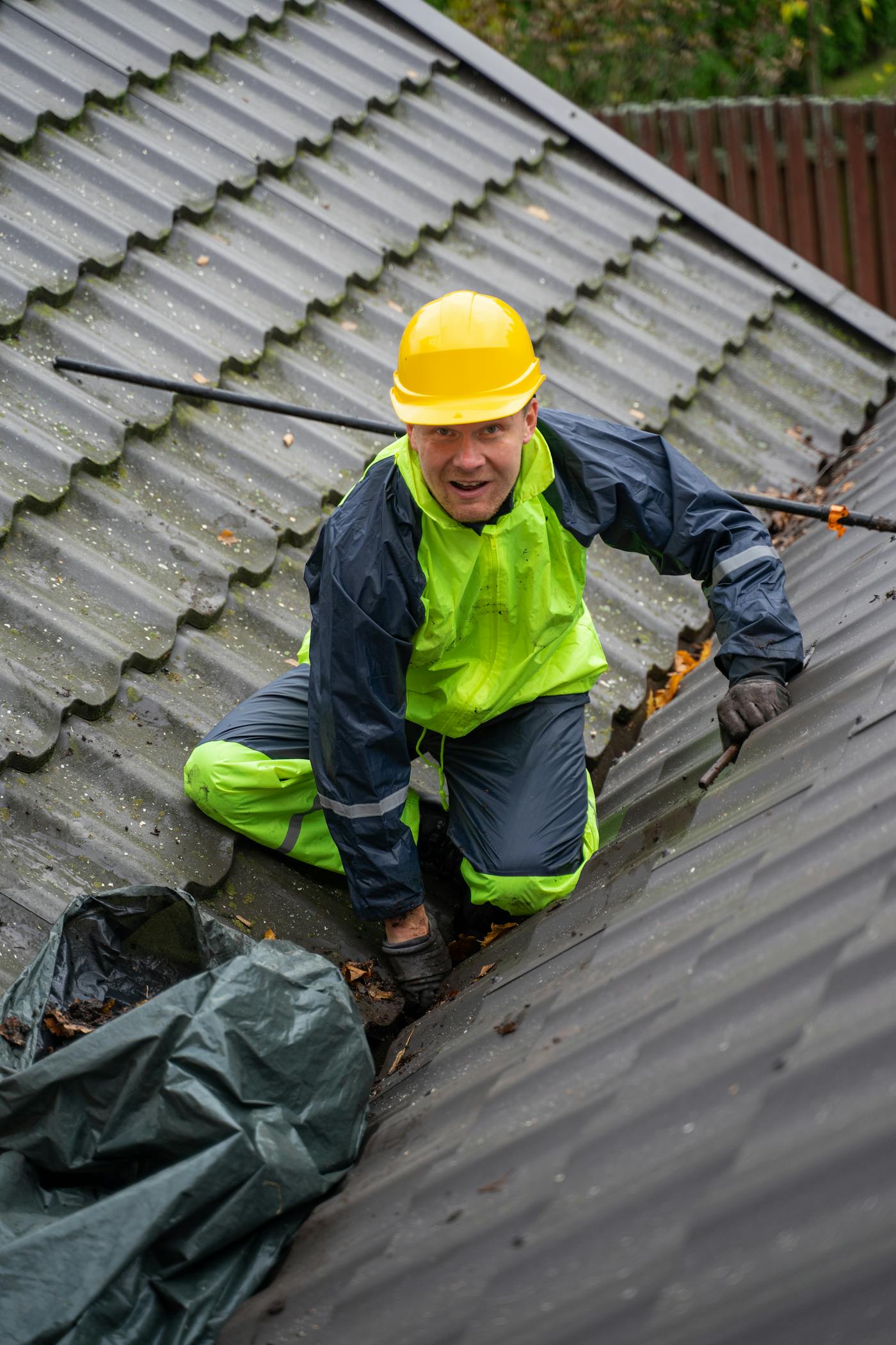 Construction worker on a residential roof